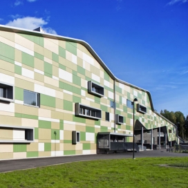 建筑师Linja-黄绿白色面板拼凑不正常弯曲的芬兰学校