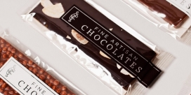 莱斯利的巧克力美食水果棒包装欣赏，巧克力都是从瑞士和法国提取最好的可可粉，一个简单的设计，让产品自己说话