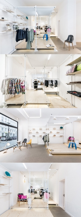 浪漫女屋-专卖店位于德国柏林，漂亮的脚手架形式货架，可移动和重新排列，存储空间被分成两个空间，前面的空间由活动元素组成，如柜台，柜和橱窗布置，可以连接断开，取决于存储的需求。不同高度的胶合板地板梁，创造了一系列的阶梯式平台