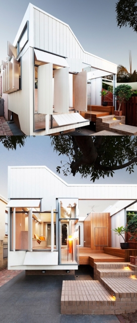 百变屋-澳大利亚 Philip Stejskal建筑设计工作室作品-采用19世纪90年代白色复式木材百叶窗伪装的墙壁，可以滑动面板，包含一个露天餐厅，一个小浴室，以及一个通道连接两个空间的封闭阳台。