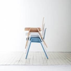 一个简单形状的胶合板椅子-通过一个夹板弯曲技术来实现，以获得座椅的曲线和腿的弯曲。