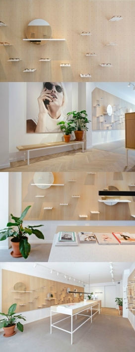 阿姆斯特丹挂板木线墙壁眼镜旗舰店设计-采用PEG孔安装木板，让显示器和后视镜可以很容易地四处移动，旨在创造一个空间，提供了一个“独特的零售体验”