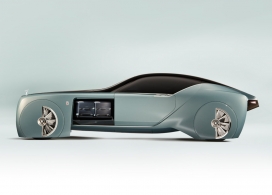 未来100年的劳斯莱斯103EX概念车设计-一个惊人的未来揭幕，一个零排放的电动动力系统，和巨大的28英寸轮毂，带来非凡的动力，由两个柔软的羊毛座椅，像沙发一样舒适包围着你
