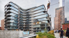 纽约520 West 28th Street公寓-一个带有钢带和圆形玻璃角的11层高住宅建筑，包括39个私人住宅和一些豪华设施。