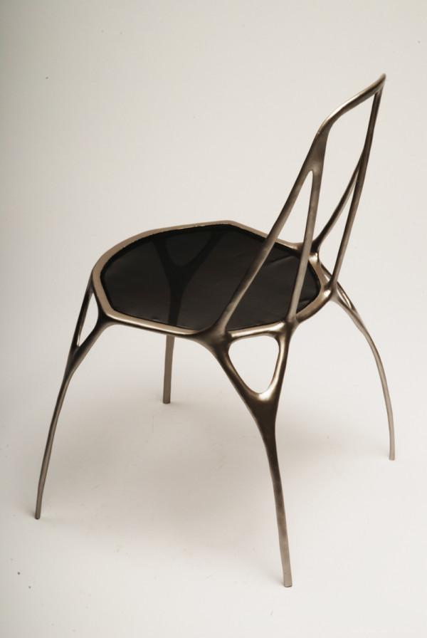 雕塑椅 丹麦设计师benjamin Nordsmark作品 灵感来自教会圣家堂 椅子最大的有趣之处是椅子投放在地上的阴影 手机移动版