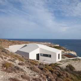 希腊悬崖岛屿的白色房屋建筑-deca建筑师作品