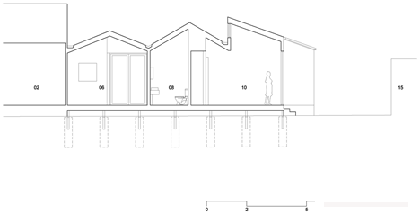 Profile House-坐落在澳大利亚墨尔本工业区,木墙上有三个小建筑物,周围有砖瓦楞铁仓库---酷图编号16