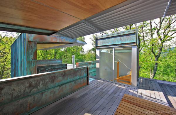 铜外壳房屋建筑-它看起来像两个分隔的玻璃桥,阳光从地面上升壁---酷图编号8