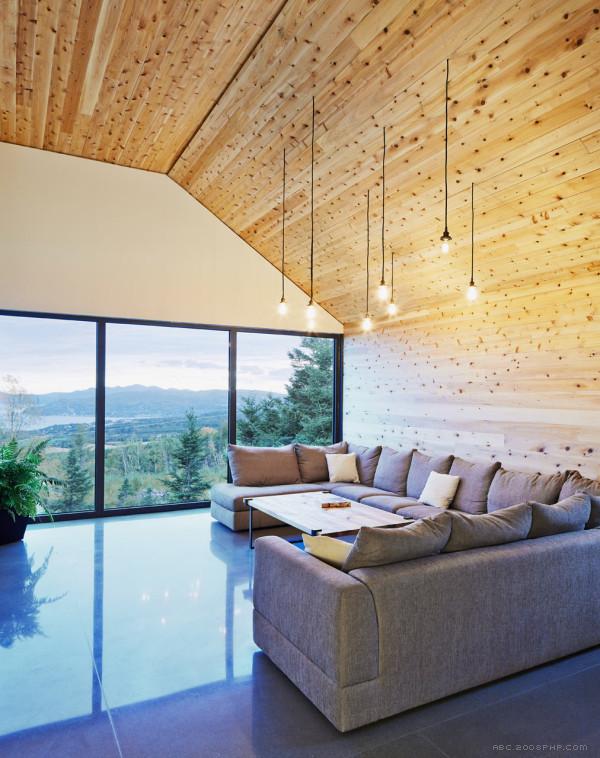 加拿大魁北克马尔贝八木质公寓建筑-周围环太平洋环绕的森林融入了崎岖的景观---酷图编号9