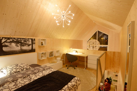 HEIJMANS公租房家园-荷兰HEIJMANS建筑公司作品-在阿姆斯特丹,是一个16平方米的阁楼房间,一个月700欧元,每两层楼的建筑拥有一个慷慨的客厅,一间厨房,一间独立的卧室和一间浴室,以及一个室外露台。---酷图编号5