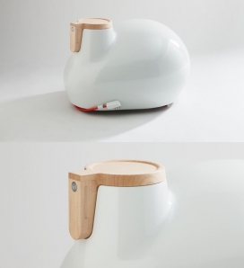 它是一个玩具，一个雕塑，还是散热器？但是，事实上，它是一种便携式电动散热器-光滑的白色或有光泽的黑色铝制外壳，有一个柞木手柄，可以让你轻松地移动加热器上的轮子