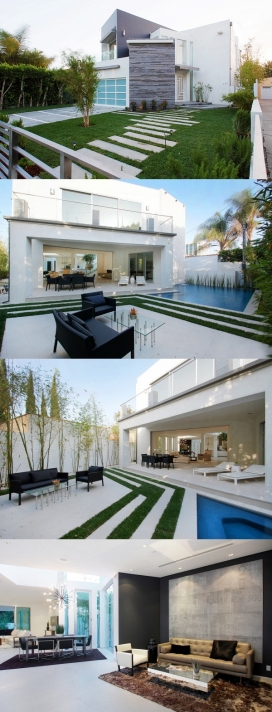 非传统不对称的房子-白色厨房里有一面墙，从地板到天花板的窗户，它也使厨房充满自然光线