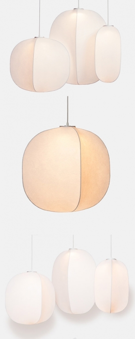 半透明茧LED吊坠灯-网状织物延伸穿过铁圈形成这些茧状吊灯，由纽约工作室Rich Brilliant Willing设计-柔和的灯光透过膜和金属框架显得越来越明显