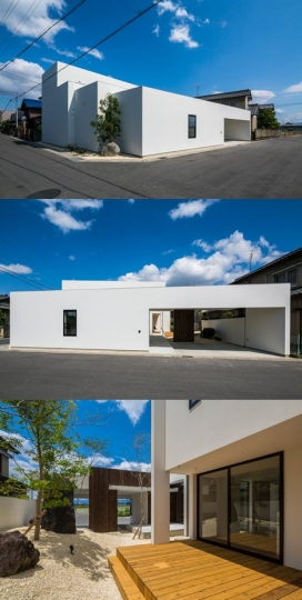 白色重叠屋-有一个朝南的公共庭院花园，可以共享远处，房屋远处看像一个巨大的楼梯