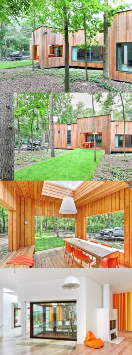 使用数学算法来定位支臂的房子-周围都有花园树木，波兰华沙建筑设计师Jakub Szczęsny作品