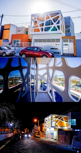 个性的孩子房子-白色无规则的前格式笼特引人注目，是为了反映儿童的内向和外向性格和他们之间的紧密关系设计的。由三个正交模块分解构成，地面层是其入口，公共停车场和私人用途，客厅和餐厅，厨房，主卧室。二楼是小孩子居住。