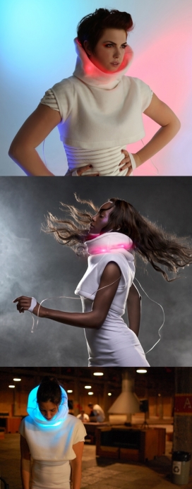 LED颈圈光圈花样毛衣时装秀-指示灯嵌入在高领布周围，有传感器，照亮颜色显示佩戴者的情绪状态，白色毛衣发出红光时，表示配戴者感觉紧张，爱情会变成蓝色，可以换到紫色代表兴奋和黄色知足