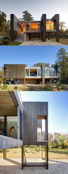 西北海港房-位于纽约东汉普顿，1900平方英尺大小的海滨住所，从地板到天花板的窗户和推拉玻璃门覆盖大部分的外墙带来最大的光