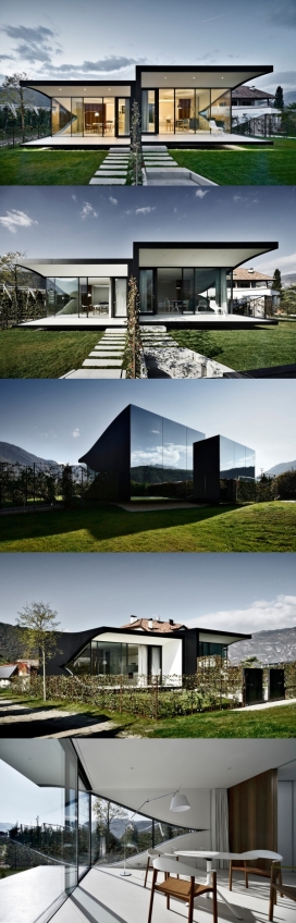 意大利博尔扎诺双假日公寓-彼得・皮希勒设计的双连度假屋，在意大利城市博尔扎诺，毫不夸张地反映大自然周围景观-里面有属于自己的私人花园和停车场，每间卧室的单元包含一个开放式厨房和客厅区，以及一间浴室。