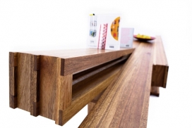 一个极好限量版手工制作的板凳，可以扭曲和折叠，板凳配备了各种插槽，可以放书籍，杂志和其他媒体设备。