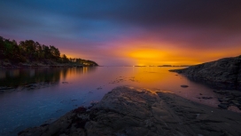 橙色夕阳海洋岩