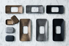 东京Odakou Douki设计公司创造的一个简约的托盘设计-柔和的曲线和简单的功能。他们专注于各种领域，包括电子产品，工业设备，家具，家居装饰和艺术。