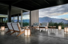 海湾坐-丹麦设计师亨里克・佩德森创建的人造板件柚木户外沙发座椅家具-一个倾斜的方式诱导你放松的状态，就好像你坐在海湾的感觉