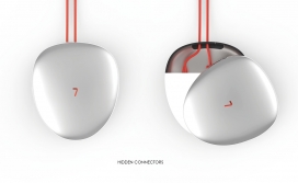 让用户专注于多媒体体验的The 7网络电视盒设计-一个高度反光的外壳，可以旋转打开隐藏连接器