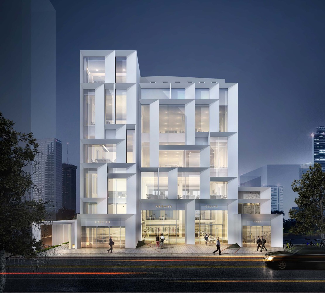 现场的情况比较复杂,建筑北侧临华山路,面向华山绿地公园,因此北立面作为建筑的主要形象立面,东侧为已有住宅小区,西侧紧邻上海电光源大楼,南侧为配电房,同时需要面对诸多老旧的建筑,改造建筑需要重新梳理与周边环境和已有建筑的关系。