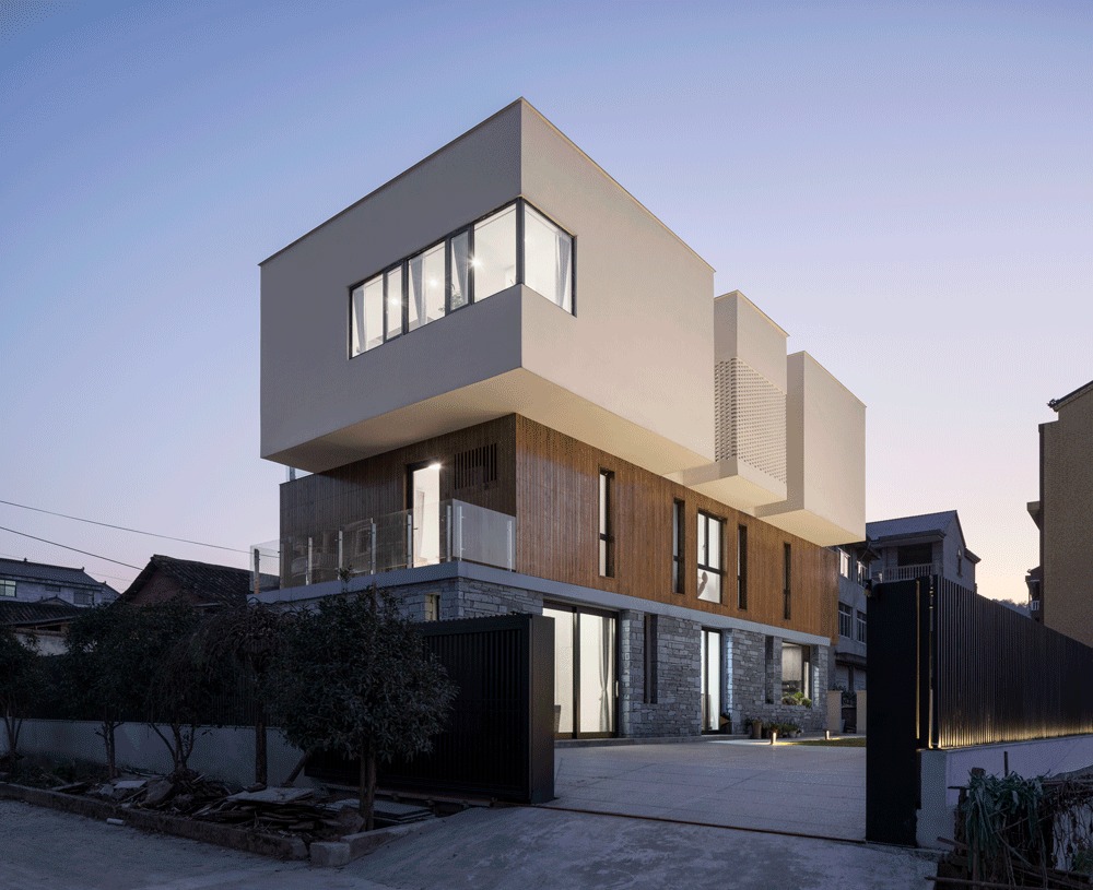 三种材料暗示了不同的功能属性,体现了建筑的轻重对比,并呈现出了递进的精神世界