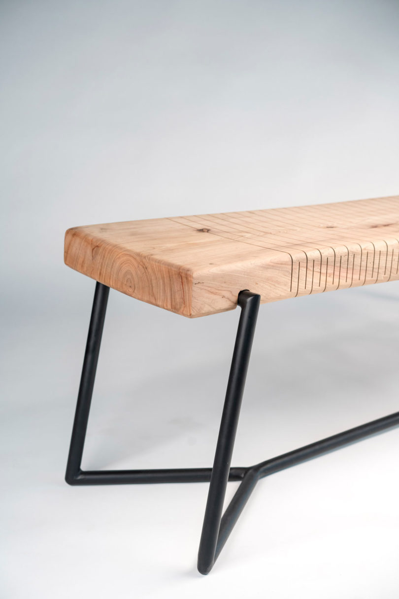 利用木材垂直切割使座椅弹跳的弯曲的木凳子---酷图编号1254571