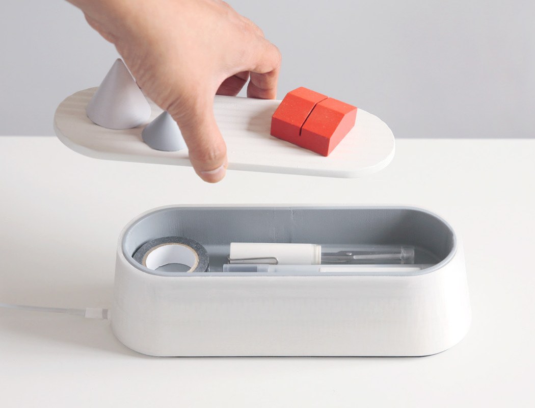 灵感来自于悬崖带充电装置的文具盒---酷图编号1292085