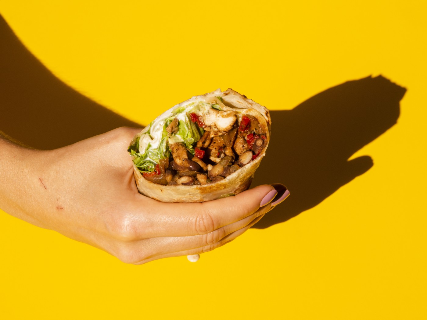 握在手中的手抓饼图片