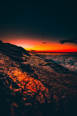 高清晰日落红海滩壁纸