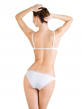 身穿白色比基尼的女性背部图片