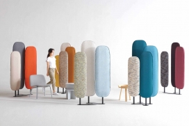 可以作为一个房间隔板，为宽敞开放式办公室空间提供隔音的纺织布屏风