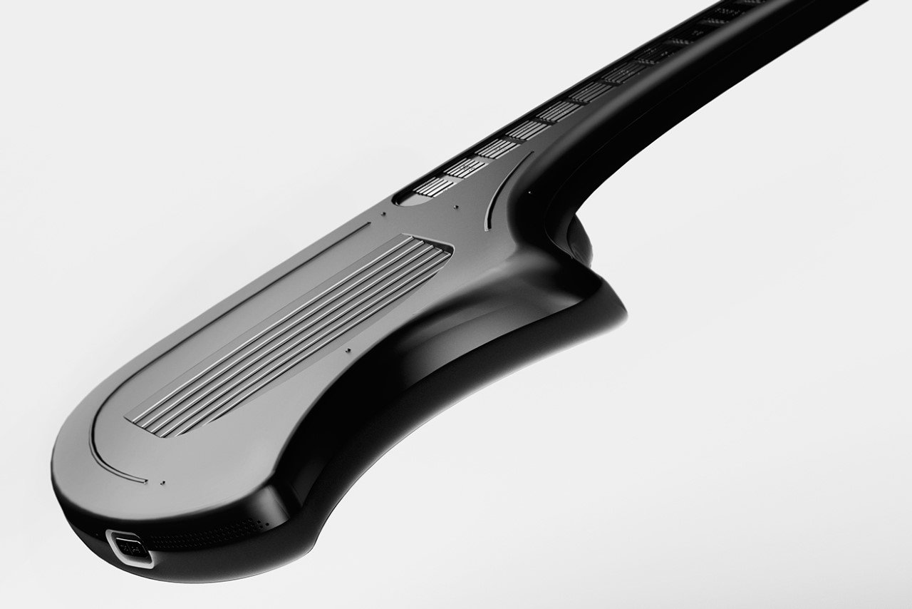 帮助视障人士掌握新乐器的盲文指板电吉他---酷图编号1