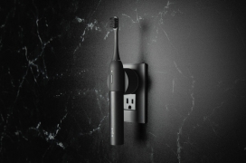 采用MagSafe设计磁性无线充电座的电动牙刷