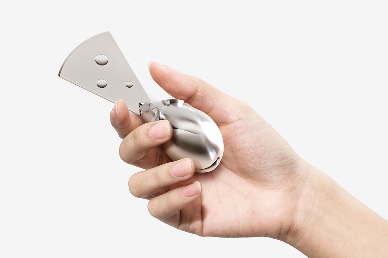 受老鼠启发的奶酪刀-让人想起了老鼠和它们的奶酪的一生追逐图片