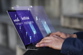 笔记本电脑前打科技代码的商务图