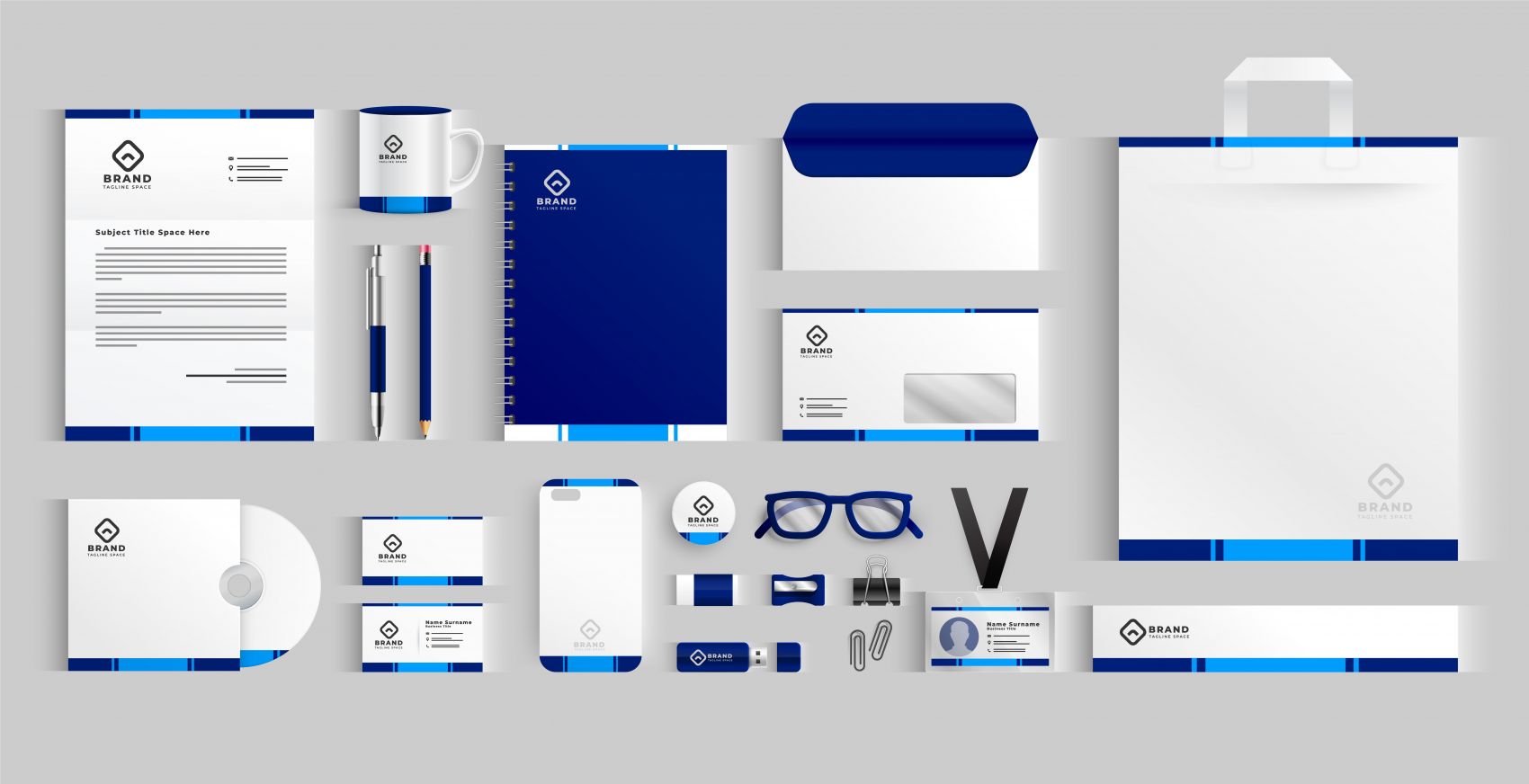 蓝白商务企业文具商务宣传册演示素材图片