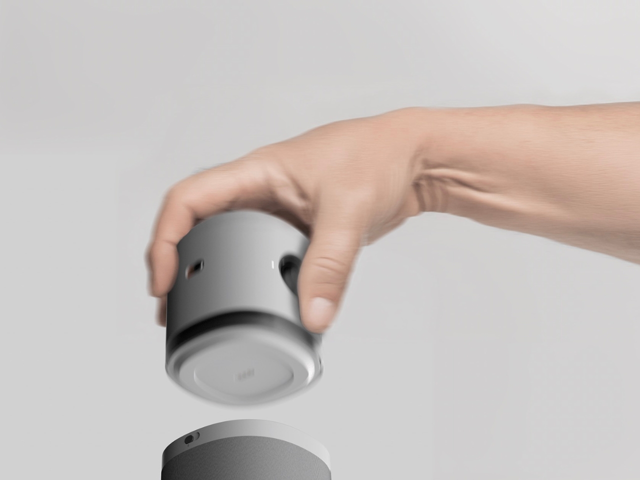 可以是扬声器也可以是无线充电器的模块化迷你投影仪---酷图编号10