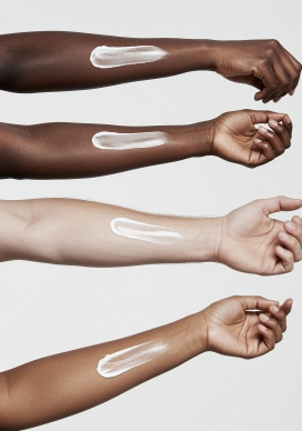 多元肤色手臂的护肤展示