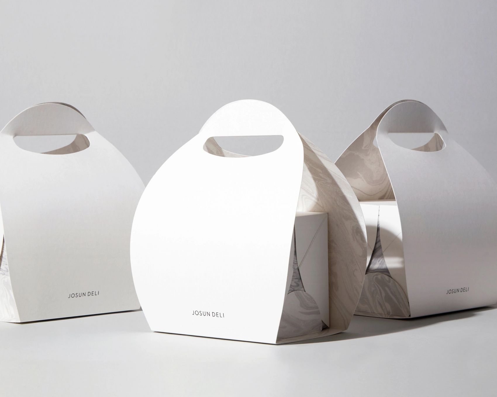 乔森德利焕新包装设计-极简白盒烘焙包装 高级感食品礼盒设计图片