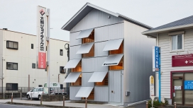 Schemata Architects为内田商店总部重新设计带有金属遮阳篷的町屋