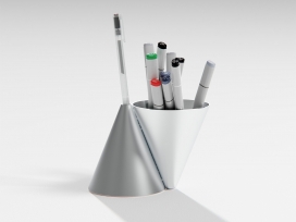 这款包豪斯风格的笔筒有两个圆锥体：一个用于放置杂物，一个用于放置笔